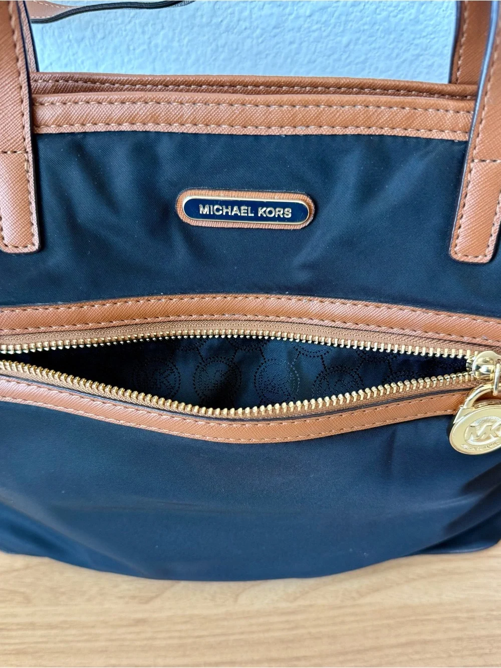 Michael Kors Black Tote with Brown Trim and Gold Hardware